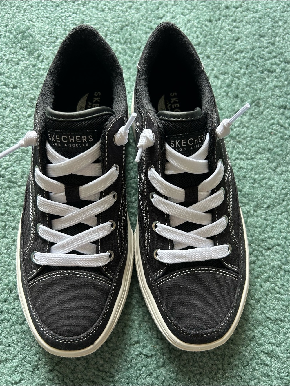 Skechers Women's Black Canvas Archfit Arcata size 7.5